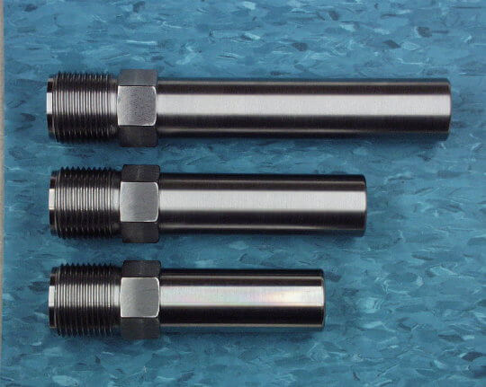 Three different sizes of nozzle bodies from Plasti-Co